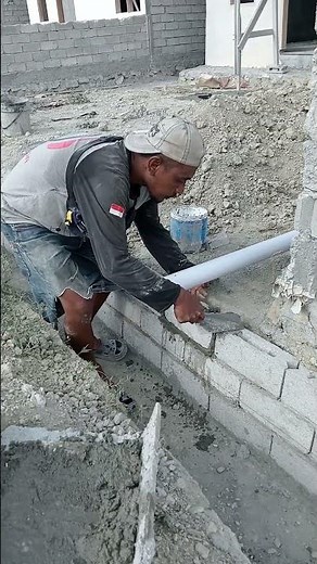 Installing retaining wall block