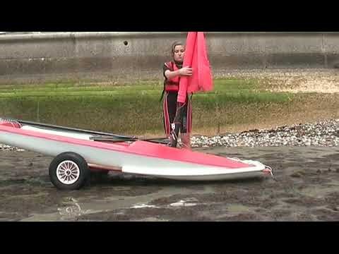 Topper dinghy rigging up & sailing away