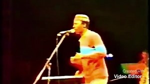 Afriki - Alpha Blondy Album: Apartheid is nazism 1985 Live at Los Angeles, USA , 1988. ➡️ vidéo intégrale sur ma page Youtube Alpha Blondy Guitar: Christian Polloni. Guitar: Julie Mourillon. Backing vocals: Corinne Polloni. Backing vocals: Monique Seka. Backing vocals: Bertin Sahui 'Saberty Waipa'. Keyboards: Romie John Lawrence 'ibis'. Percussions: ‘Lion' Lyrics - Paroles Sam! Takè n'djou la Ouaille aïe aïe! Anbôla farafina Ko ambêta an sénan yara Yé Anséla Montego Bay, Kingston J.A Niga mounou