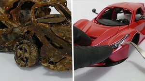 Meticulous restoration of filthy model Ferrari