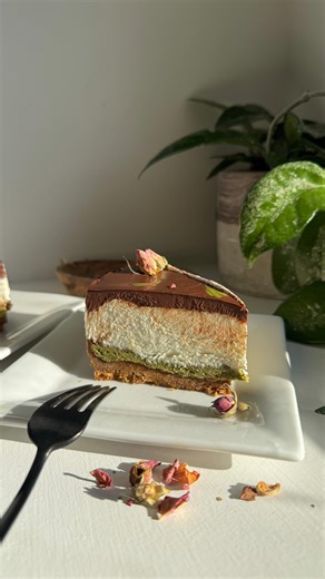 Zehra Allibhai - Fitness & Wellness Coach on Instagram: "Pistachio Kunafa Cheesecake This cheesecake requires just love and a little patience while you make each delicious layer that all work so well to create this rich creamy dream of a dessert! No baking required. I cannot wait for you to give this a try! Wow your loved ones at your next dinner party! Comment “Cheesecake” and I’ll DM you the recipe! #Cheesecake #kunafa #dessert #nobakedessert"