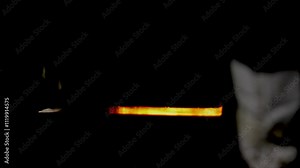 forging steel industry, drop forging metal piece shaping automatic drop hammer a tool shape. Open die forging hit by hammer on a tool mould cast to form a machine component part weld factory