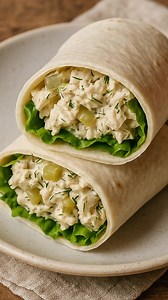 Dill Pickle Chicken Salad Wraps – Cool, Tangy, and Ready in 10 Minutes Ingredients: 2 cups cooked chicken, shredded (rotisserie works perfectly) ½ cup mayonnaise (or Greek yogurt for a lighter version) ½ cup diced dill pickles 1 tablespoon pickle juice (optional, for extra tang) 1 tablespoon chopped fresh dill (or 1 teaspoon dried dill) Salt and black pepper, to taste 4 large flour tortillas or wraps Optional add-ins lettuce, sliced cheese, or pickle slices for extra crunch Instructions: In a me