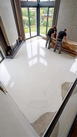 Deepnewsai on Instagram: "This AI-generated video of workers making epoxy flooring looks unbelievably realistic 😮✨. The smooth pouring, precise spreading, and glossy reflections are oddly satisfying to watch, making the whole process feel mesmerizing. Every detail—from hand movements to light reflections on the surface—shows how advanced AI visuals have become. It looks like a real industrial time-lapse, but it’s actually a perfect blend of simulation, texture modeling, and motion realism creat