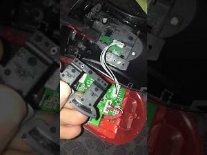 How to open the Lenovo Y Gaming Optical Mouse