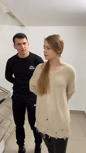 Playful Boxing Match in a Stylish Indoor Setting