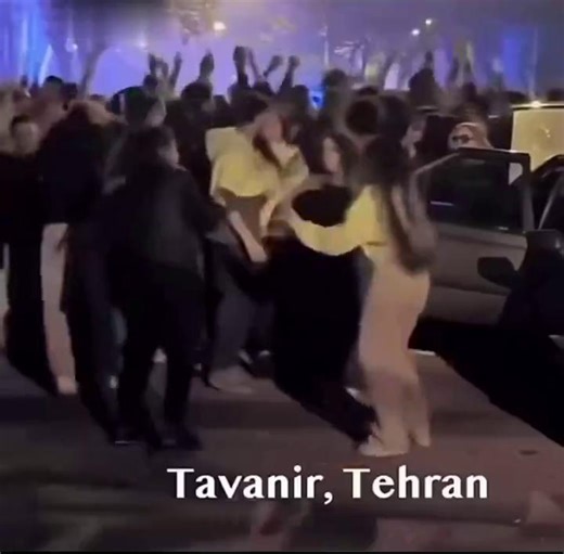 Iranian women dancing, hair uncovered, no hijabs, right outside Tehran’s power company. Tavanir used to control the electricity. Now the women have the real power. | Hananya Naftali