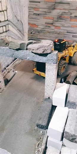 Caterpillar 993K Meets 100t Granite Block