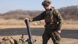 Marine troops train with mortars during combat drill