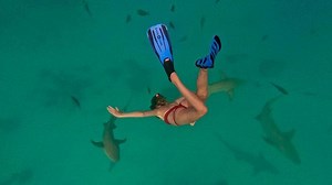 Strictly and EastEnders star Rose Ayling-Ellis wows in red bikini as she goes swimming with sharks