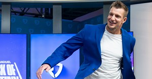 WATCH: Rob Gronkowski jumps out of plane to kick off Week 10, spikes football upon landing