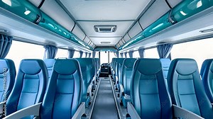 High-resolution image of a commercial bus emphasizing interior design