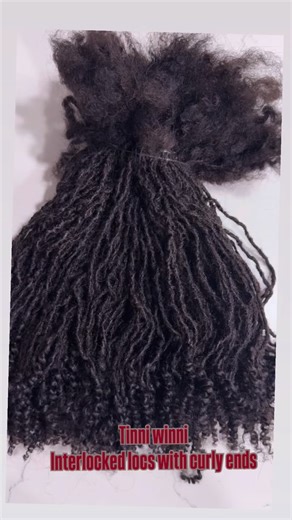 1.2K views · 8 comments | These are our Tinni winni interlocked Locs with curly ends. This year “2026” we will be adding different variations of loc extensions. However, we will still be maintaining our strong stance on texture matching. Especially when it comes to PERMANENT Loc extensions. #microlocs #fyp #dreadextensions #locextensions #tinylocs | Prettybelledreads Bella | Facebook