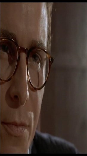 Patrick Bateman showcases his elite business card