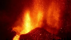 Lava spews as Canary Islands volcano erupts