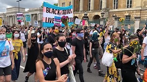 BLM campaigners march in London as police surround Churchill statue