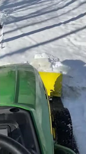 Plowing Snow with my John Deere x320 Riding Lawn Mower with a 44" Front Blade