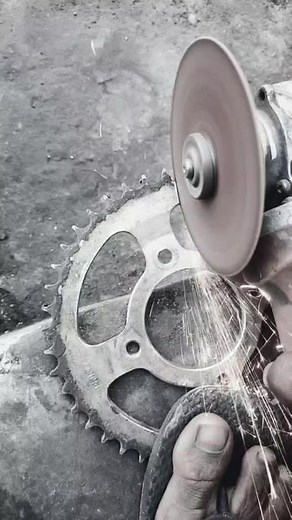 Close-Up of Piston Gear Grinding Process