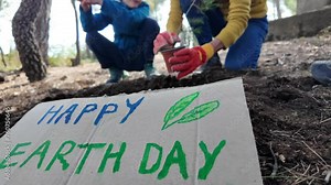 Family is actively engaged in the noble task of cleaning up litter and debris scattered throughout the forest, demonstrating their commitment to environmental stewardship and community