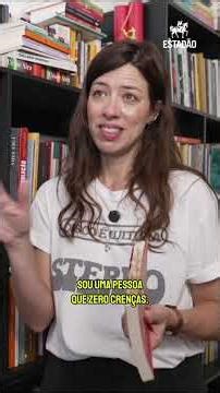 Roberta Martinelli shows books from her personal collection.