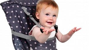 This portable high chair can be used on any chair.