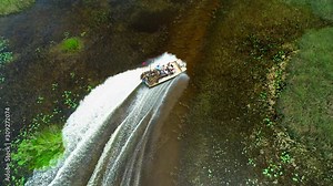 Air boat racing on a swamp river. Florida. USA.