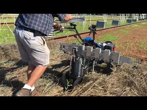 Grain drill, roller/crimper, and vegetable transplanter system for walk behind tractors