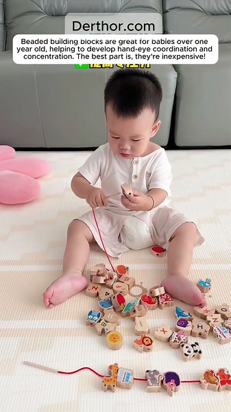 Beaded building blocks are great for babies over one year old, helping to develop hand-eye