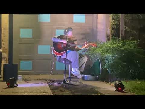 Madison King performing while her daughter dances