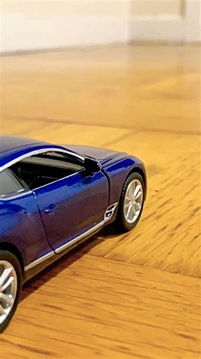 Smaller Diecast Model Cars Stopped By Finger