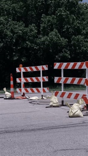 clip-4102805993-man-holding-no-data-centers-sign-construction