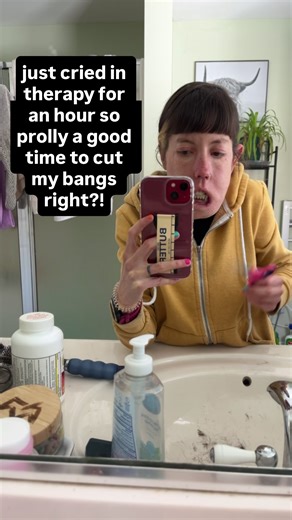 “Things Are Horrible, I should Cut My Bangs” the title of my next next book gotta do what you do in trying times ya know. video description: hannah cutting her bangs while talking to the camera