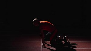 Starting From Low Start Position On Running Track In Stadium, Professional Runner Training