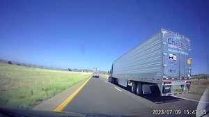 BuzzVideos - Dash Cam Captures Aggressive Trucker Running Another Big Rig Off the Road