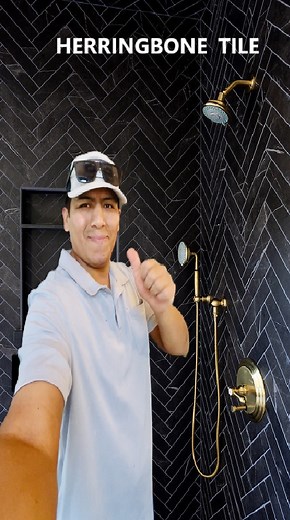 This project showcases elegance and precision in every detail. We installed black 4x12 tile in a Herringbone pattern across the walls, creating a dynamic design that adds movement and style to the space. The shower is curbless, offering a clean, modern, and comfortable entry for the whole family. We also added a custom-made niche, designed for both functionality and aesthetics. On the floor, we used hexagon tile, achieving a perfect contrast that complements the Herringbone layout and enhances t