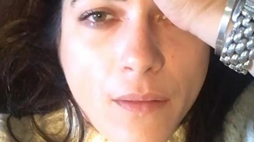 Selma Blair breaks down after driving away from gas pump with nozzle