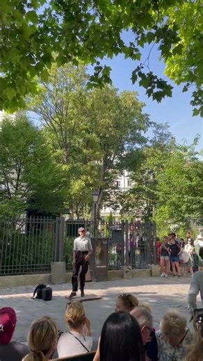 Cute French street dancer is performing in Paris