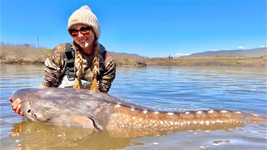 Watch this woman battle a giant 10-foot river monster
