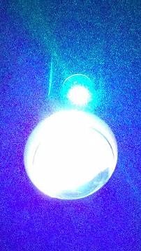 Projection Show with stars and neon galaxy type pattern w/ Star Belly Dream Lites Commercial Jingles