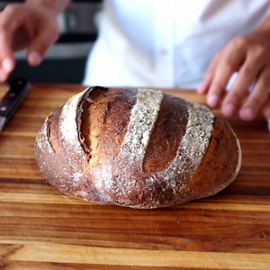 To end the struggle to slice through the bottom crust of a rustic loaf it’s as simple as a shift in perspective. Find more ways clever cooks get things done in our Kitchen Hacks book: http://cooks.io/2lmZpZD | America's Test Kitchen
