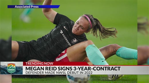 Denver Summit sign defender Megan Reid