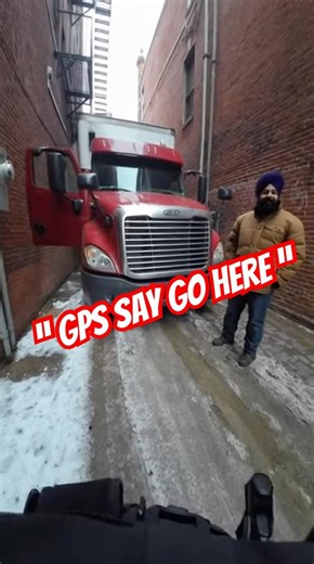 Semi truck gets stuck in alleyway