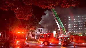 Tires catch fire at Salt Lake store, spewing fumes and spreading to vacant home