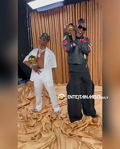 Burna Boy featuring Wizkid 🎵 “Ballon D’Or” Download song here ⬇️ http://www.entdaily.com.ng/2021/12/14/burna-boy-b-dor-ballon-dor-ft-wizkid/ | Entertainment Daily