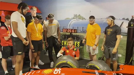 Tennessee basketball players change F1 tire at Ferrari Museum in Italy