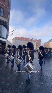 🎺 Royal Guard Marching Through Copenhagen | Iconic Scenes at Kultorvet 📸 My Danish Experience 📝 A classic Copenhagen moment 🇩🇰 The Royal Guard of Denmark marching proudly through the streets of Copenhagen, seen here at Kultorvet, accompanied by powerful drum beats that echo tradition and discipline. Their perfectly timed steps, traditional uniforms, and rhythmic drumming turn an everyday street into a living display of Danish royal heritage. Moments like these beautifully reflect Copenhagen