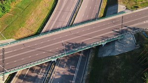 Highway interchange multiple road interchanges. Traffic cars driving on a motorway