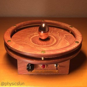 Tesla’s Egg of Columbus: http://physicstoys.blogspot.com/p/physics-toy-store.html A copper ellipsoid egg (PhiTOP) mysteriously spins and stands upright in this modern version of Tesla’s famous demonstration from the 1893 World’s Fair in Chicago that first showcased the principles behind wireless power transfer and his AC induction motor. Rotating magnetic fields from under the wooden platform induce electric eddy currents to flow in the copper PhiTOP- these currents then create their own magneti