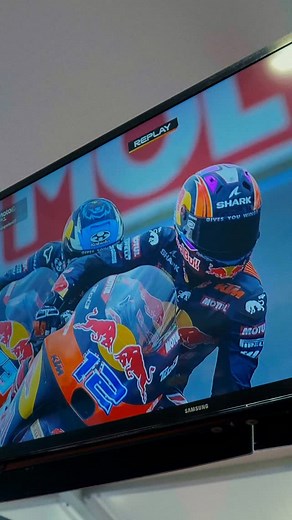 Mom, Dad, I’m on TV! 📺 A beautiful moment of slow-motion communion with @jacob.roulstone and @valentinperrone73 🧡 #RedBullKTMTech3 #RedBull #MotoGP #Motul #JR12 #VP73 #Tech3Family | Tech3 Racing