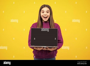 Student school girl with laptop on isolated studio background. Video online webinar, learn on laptop, elearning lesson, pc computer call. Screen of Stock Photo - Alamy
